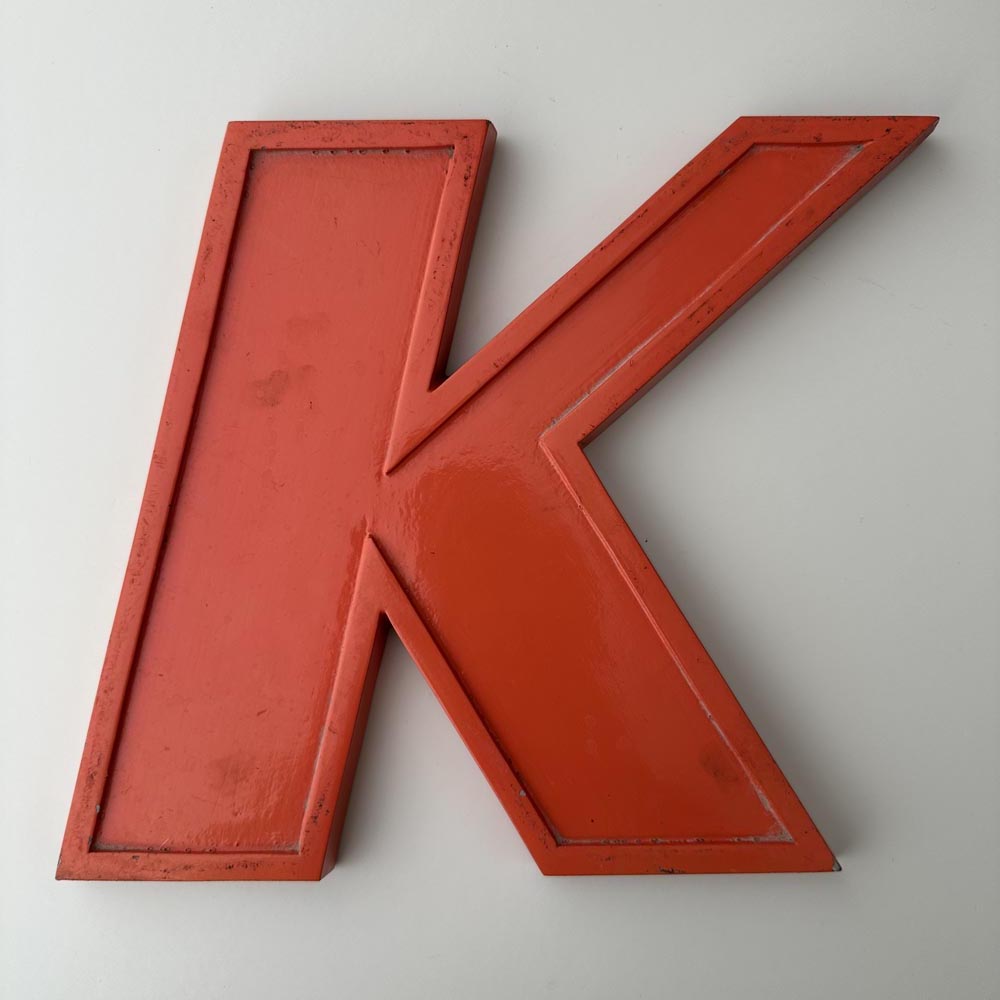 K - 9 Inch Orange Italic Metal Letter